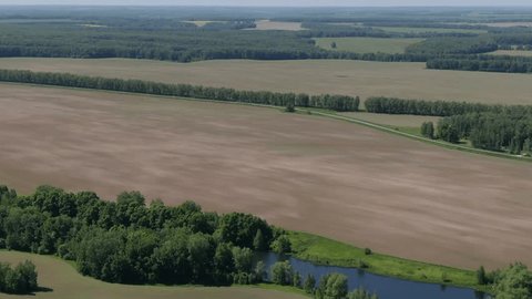 Aerial Rotation High above Countryside Fields Forest