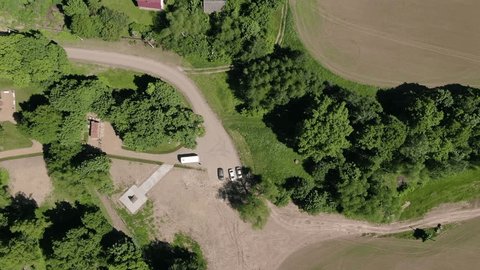 Aerial Sideways Movement above Rural Houses Road