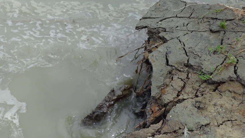 A closeup view of river erosion on a remote riverbank in Dhalchar, Bhola district.