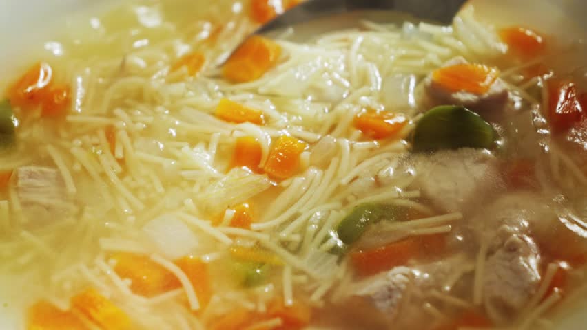 Chicken noodle soup with vegetables. The concept of homemade food.
