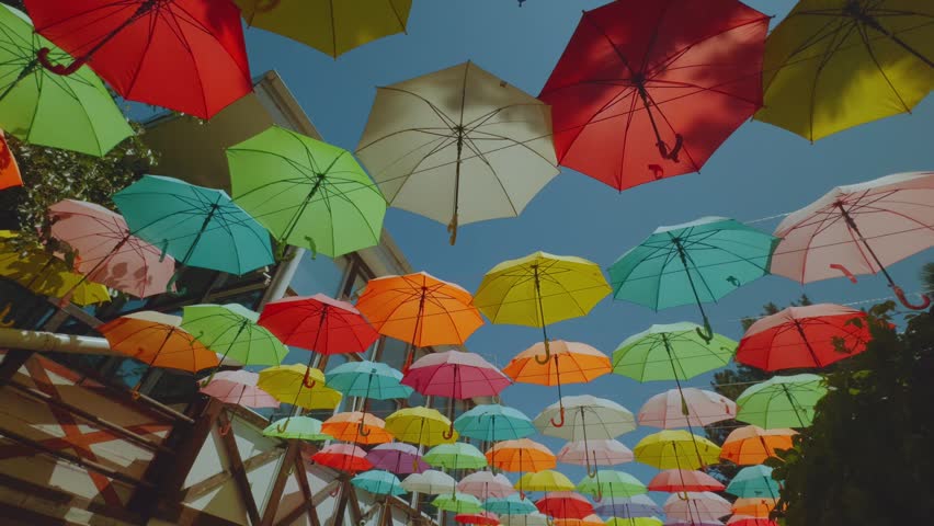 Decorative umbrellas, colored umbrellas, umbrellas as decoration, suspended colored umbrellas
