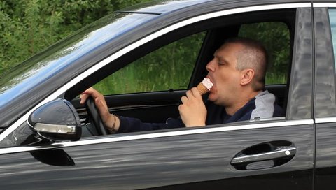 Man eating ice cream while sitting in car episode 2