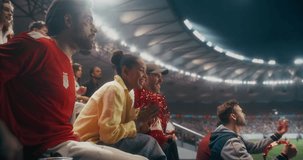 Portrait of Happy Multicultural Soccer Fans Cheering and Applauding in a Packed Stadium During a Professional International League Championship Match, With Confetti and Scarves, Slow Motion. - Powered by Shutterstock - Get 15% off with code: PIKWIZARD15