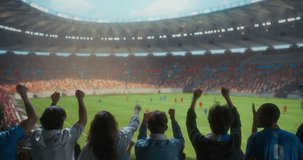 Back view Soccer Supporters Celebrate in a Packed Stadium, Raising Arms and Clapping During a Professional International Championship Match Game at a Major World Tournament Event - Powered by Shutterstock - Get 15% off with code: PIKWIZARD15