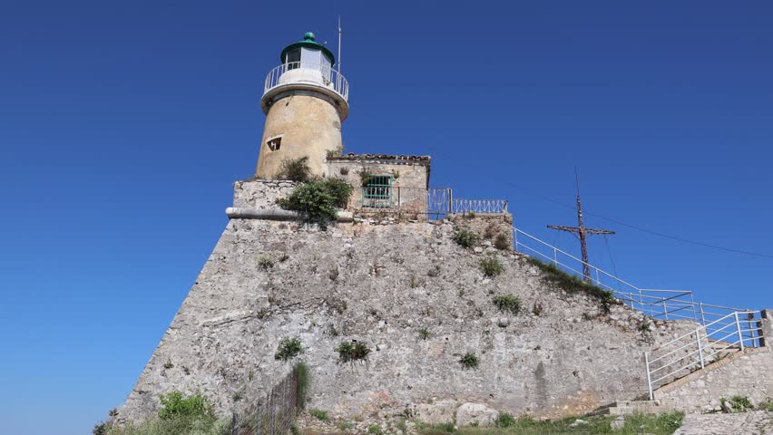 Lighthouse in Old Venetian Fortress in Corfu town on Corfu Island, Greece, 4k