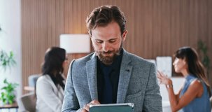 Face, man and tablet in office with journalist, meeting and opportunity or ambition. Confident, reporter and person with smile for career development, digital media and laugh in coworking newsroom - Powered by Shutterstock - Get 15% off with code: PIKWIZARD15