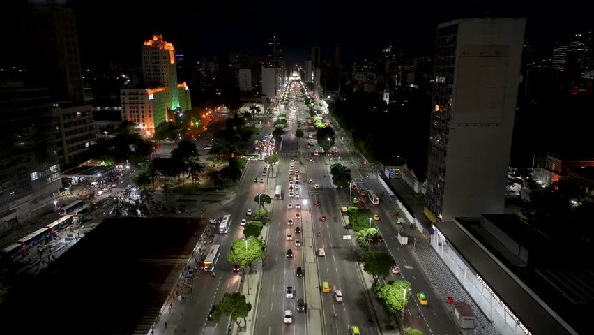 Night President Vargas Avenue In Rio De Janeiro Brazil. Modern City Center With Skyscrapers Reflecting The Urban Life. Building Illuminated Urban. Town Panorama. City Landmark. Rio de Janeiro Brazil.
