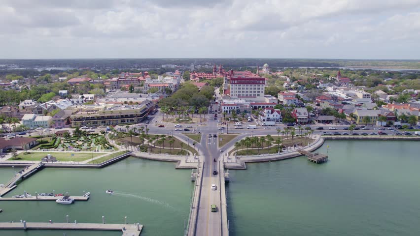 Panoramic aerial sweep of the red-roofed Spanish colonial buildings in historic St. Augustine.