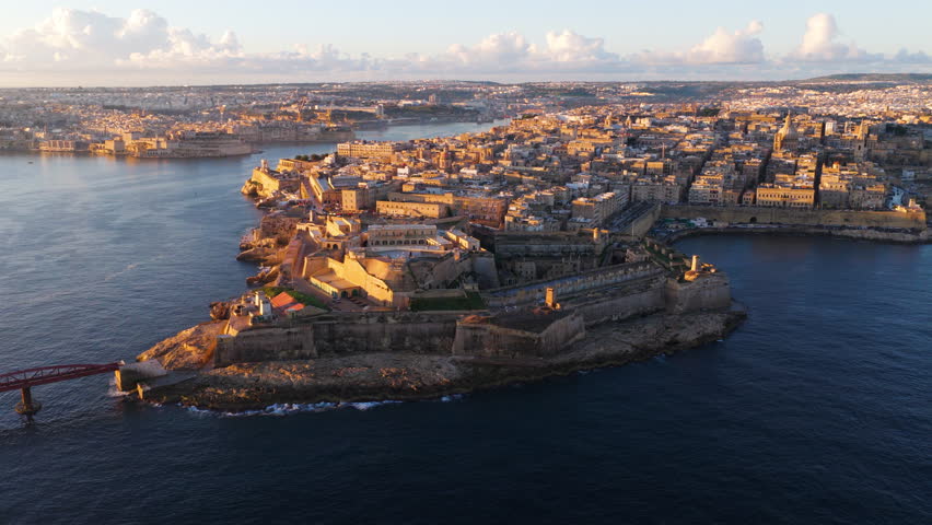 Fort Saint Elmo At The Tip Of The Sciberras Peninsula In Valletta, Malta At Sunrise. Aerial Drone Shot