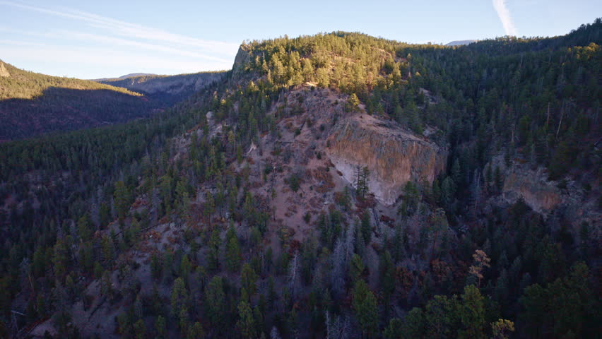 Drone shot of craggy cliffs and canyons near Los Alamos New Mexico