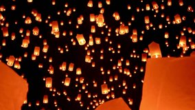 The air lanterns floating in the air during the Loy Krathong festival create a mesmerizing atmosphere that attracts everyone's attention at night. - Powered by Shutterstock - Get 15% off with code: PIKWIZARD15