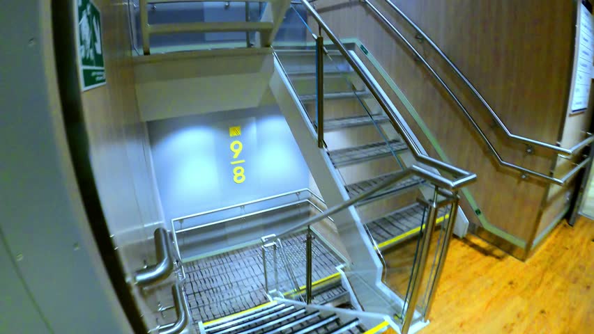 Internal stairs with rail on a ferry.