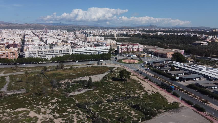 Aerial approach to the town of Elche, Spain