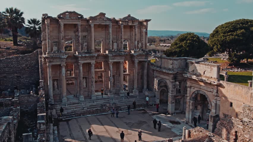 Aerial view of the Library of Celsus and surrounding columns in Ephesus, Izmir, Turkey. Ancient ruins, marble remains and Roman architecture reveal the grandeur of this historic site.