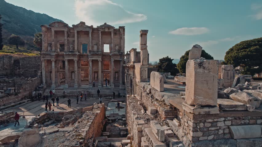 Aerial view of the Library of Celsus and surrounding columns in Ephesus, Izmir, Turkey. Ancient ruins, marble remains and Roman architecture reveal the grandeur of this historic site.