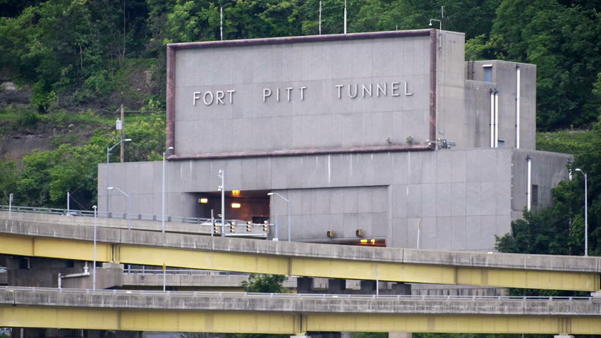Vehicles enter and exit the Fort Pitt Tunnel near downtown Pittsburgh,