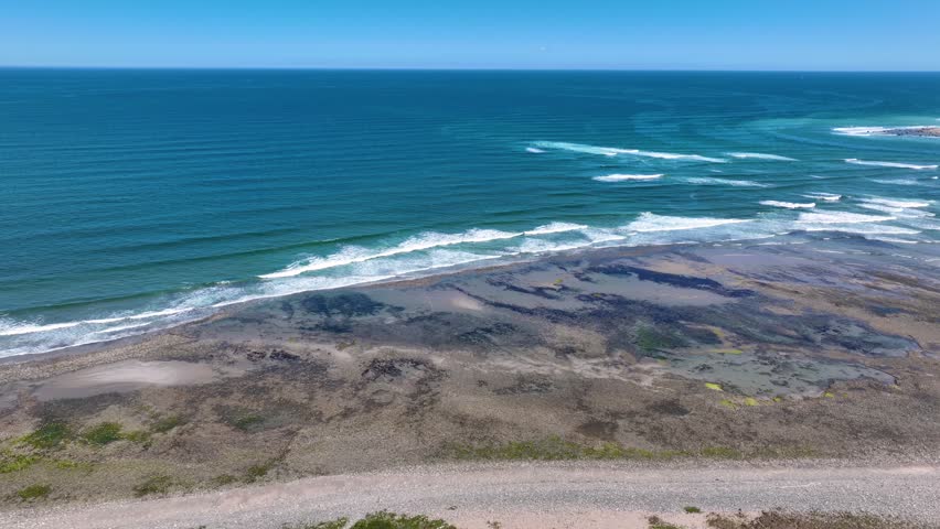 North River mouth to the Atlantic Ocean aerial view between Third Cliff and Fourth Cliff village in town of Scituate, Massachusetts MA, USA. 