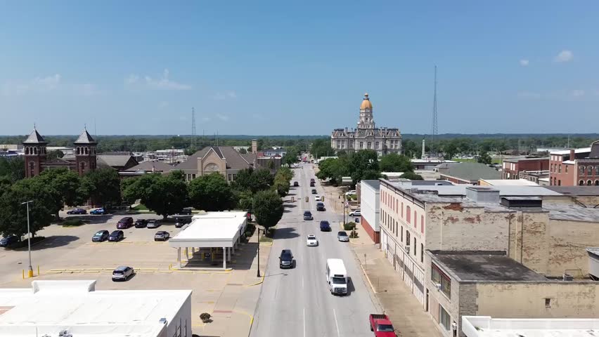 Traffic on  calm city street on a warm summer day

