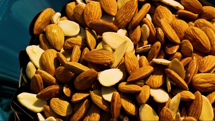 Roasted nuts served in a bowl as a healthy snack.