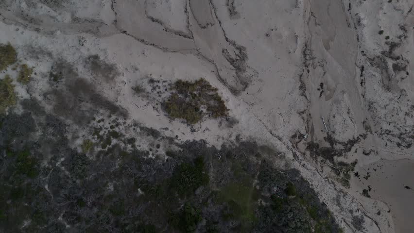 South African Shoreline Aerial Capture. Serene Coastal Landscape With Footprints And Turbulent Waves