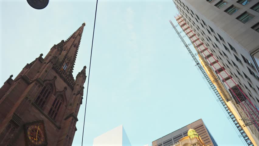 Trinity Church low angle with office buildings New York 