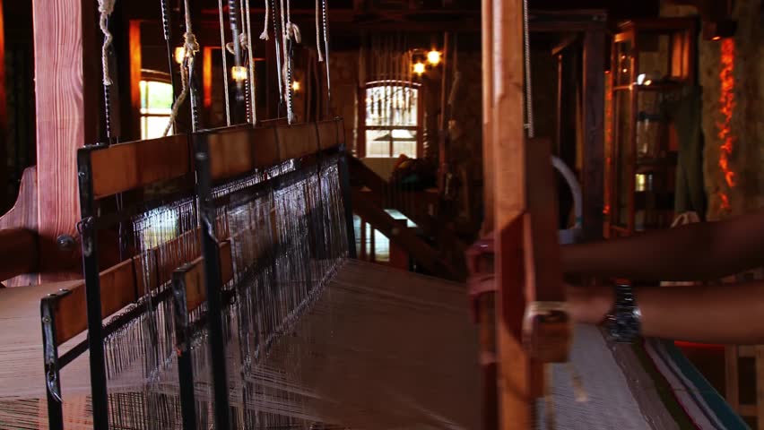 Traditional Hand Weaving Process on an Ancient Wooden Carpet Loom