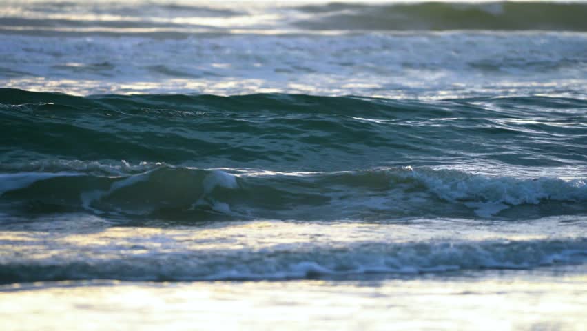 Entrancing waves roll in to Daytona Beach FL on a calm morning