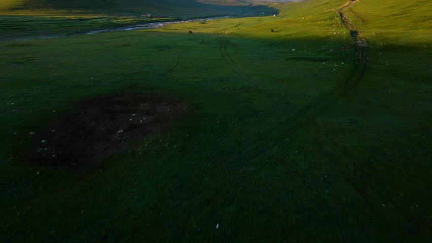 Flying Over Sary-Jaz Valley (Sary-Jaz) In The Eastern Corner Of Kyrgyzstan Within The Central Tian Shan Mountain Range. Aerial Drone Shot