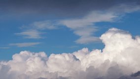 Beautiful cumulus clouds drifting across blue sky in slow motion, cinematic cloudscape background with soft white clouds and clear atmosphere
 - Powered by Shutterstock - Get 15% off with code: PIKWIZARD15