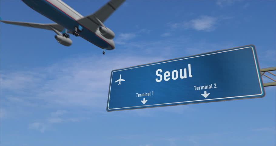 Airplane landing in Seoul. Plane travel to South Korea arrive with airport signboard.