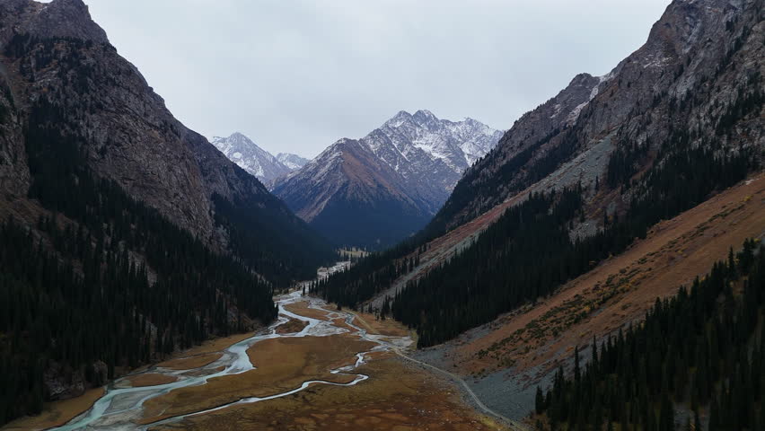 Mountain Valley with River and Peaks