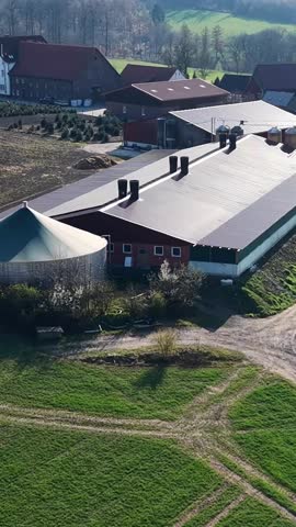Agricultural farm building with biogas plant generating energy