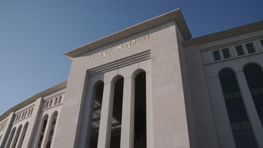 Handheld shot of Yankee Stadium on a spring day. Shot in The Bronx.