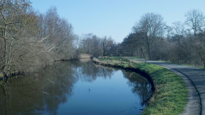 Scenic winter landscape with a river and path