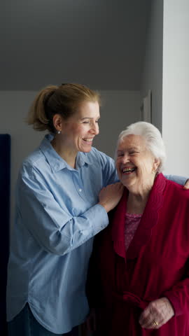 Mand adult daughter hugging, celebrating Mother