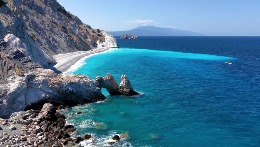 Aerial view of the famous Lalaria beach at Skiathos island, Sporades, Greece, with turquoise, shining sea and no people