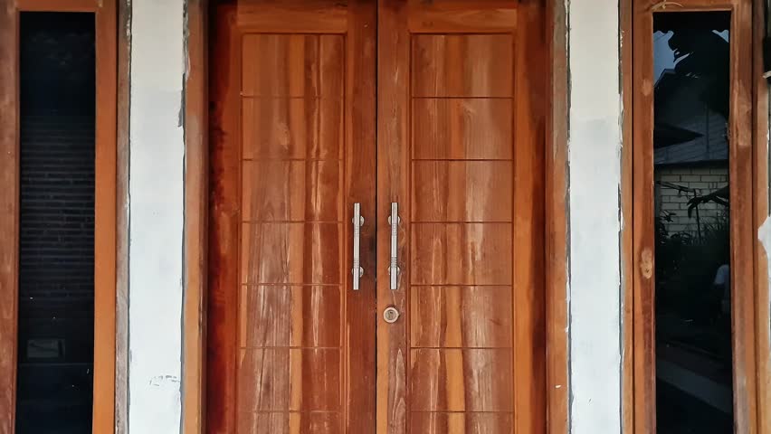 Simple Traditional Double Wooden Doors with Minimalist Sidelight Windows on White House Wall