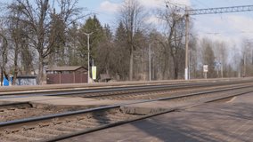 Freight Train Passing. Intermodal Freight Train Advancing Beside Station Platform Scene. Efficient Logistics Scene Capturing Cargo Train Passing Station With Detailed Chassis And Wheels - Powered by Shutterstock - Get 15% off with code: PIKWIZARD15