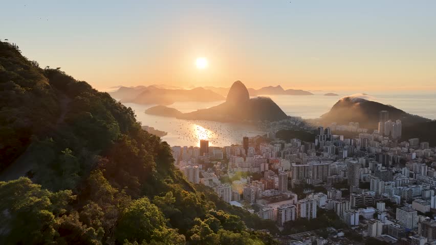 Rio De Janeiro Skyline In Rio De Janeiro Brazil. Bird Eye View Of A Amazing Coastal Beach In The Summer Holiday. Sunset Sky Downtown Cityscape. Sunset Drone View Panoramic. Rio de Janeiro Brazil.
