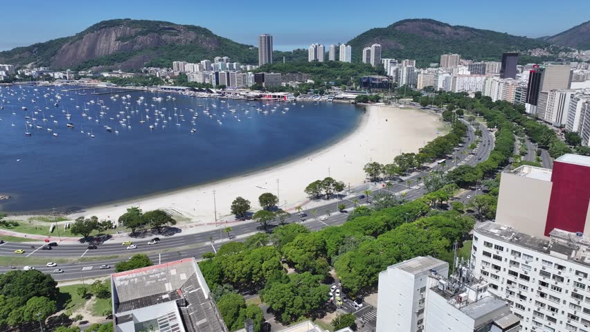 Botafogo Beach In Rio De Janeiro Brazil. Aerial View Of Stunning Beach With Crystal Clear Waters. Business Sky Downtown Cityscape. Backgrounds Up Above. Rio de Janeiro Brazil.