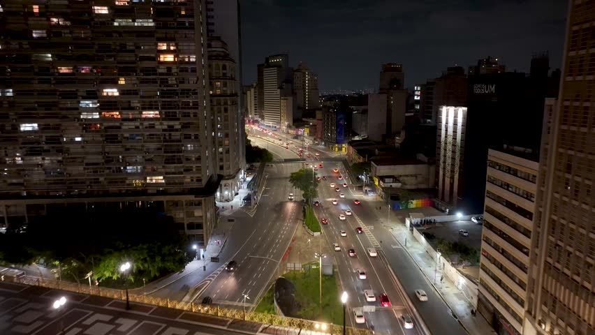 23Rd Of May Avenue In Sao Paulo Brazil. Cars Driving Towards Downtown City On The Famous Bridge. Night Elevated Road Downtown Cityscape. Night Panning Wide. Cities Of The World. Sao Paulo Brazil.
