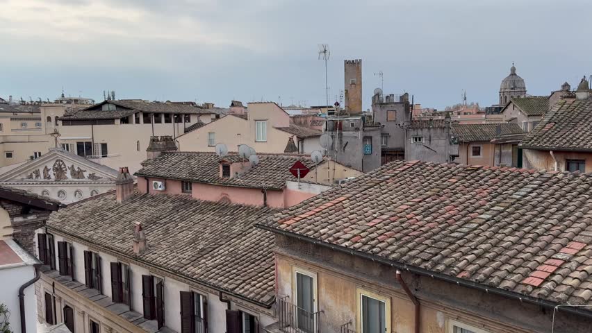 Scenic Rome rooftops vista on an overcast springtime day, Italy