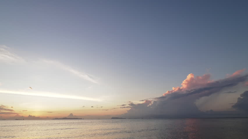 After sunset glowing over tropical sea. Time lapse.  