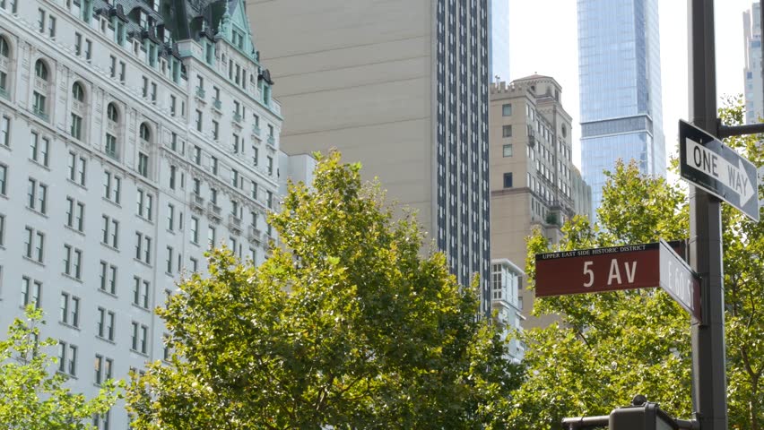 New York City Manhattan Midtown, United States. Old historic hotel building 1907 on Grand Army Plaza, 5 fifth avenue sign near Central Park. Classic iconic american architecture. Pulitzer Plaza in NYC