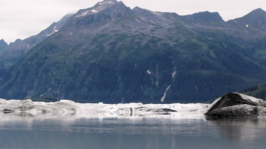 View Of Glacier Ice Dissolving Into Freshwater Lake