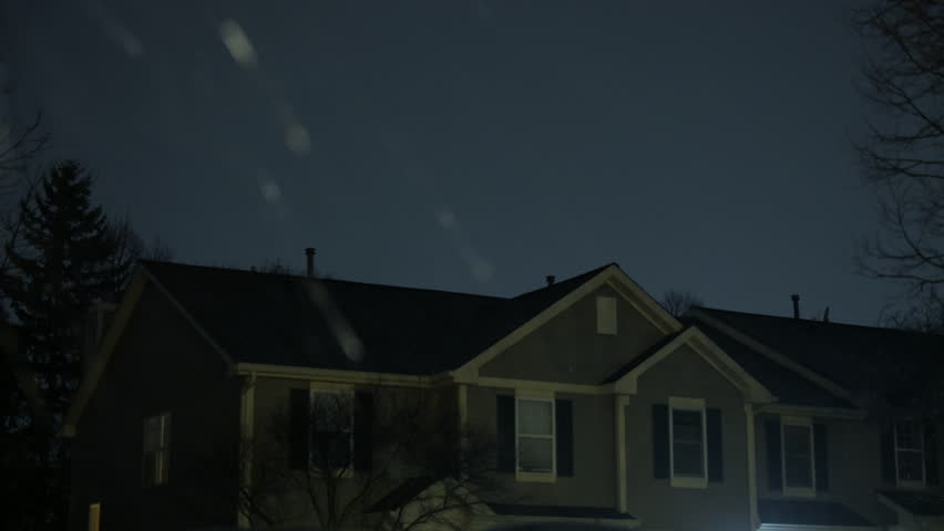 Stormy sky. Flashing lightening of thunderstorm strike the sky above the residential house. 