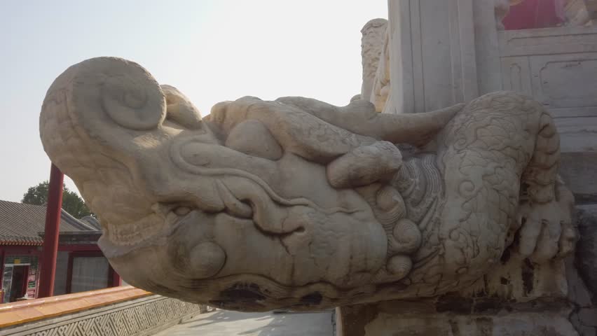 Ancient Chinese Stone Dragon Sculpture in Beihai Park.