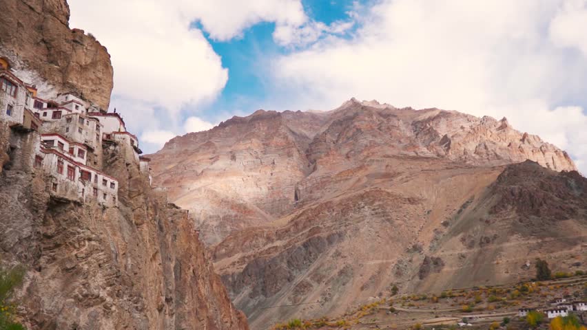 Beautiful landscape of Indian Himalayas during autumn season in Zanskar, Ladakh, India. Tall mountain and clouds in sky near Phugtal monastery. Travel and exploring hidden gems concept.