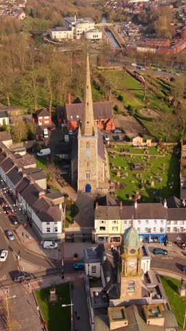 Front-on 60FPS vertical social ratio aerial GV of Lisburn Cathedral in Lisburn, County Antrim in Northern Ireland. Produced in 1080x1920 with Rec709 color.