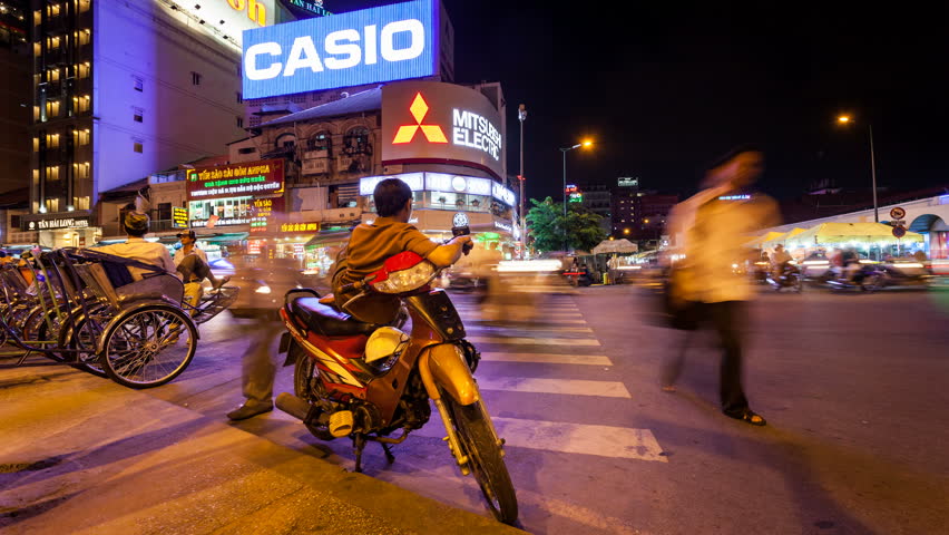 HO CHI MINH CITY - JUNE 8: Timelapse view of vietnamese moto taxi driver waiting